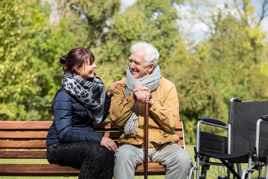Elder man and caretaker