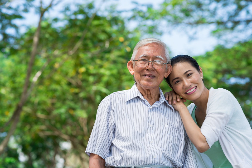Father and daughter smiling