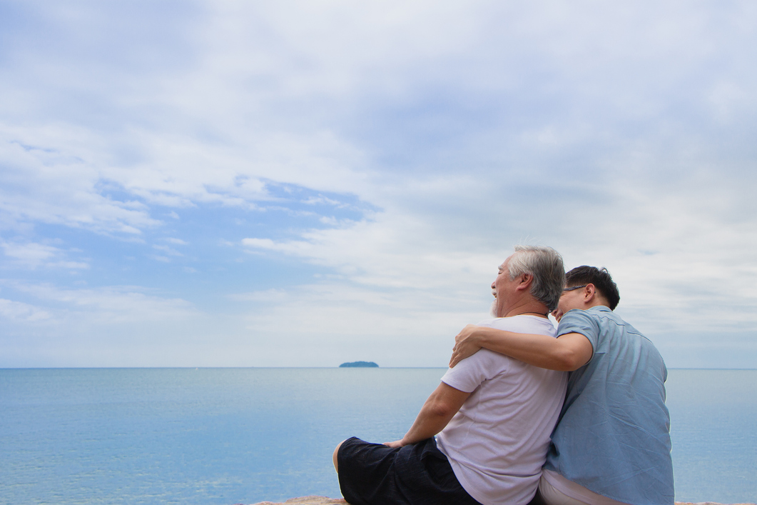 Father and son on the beach