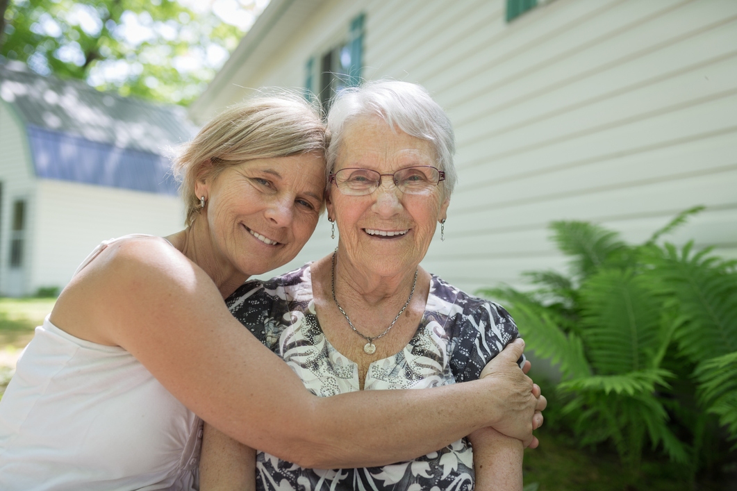 Mother and daughter outdoors