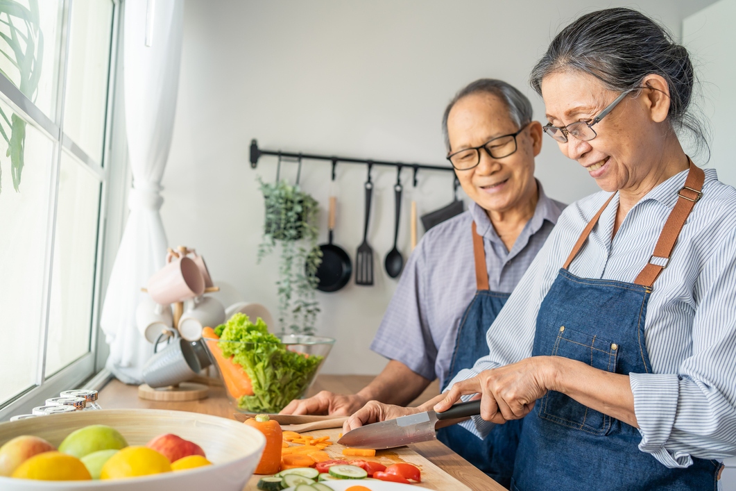 Senior couple cooking together