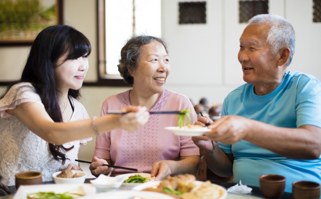 Senior family eating dinner